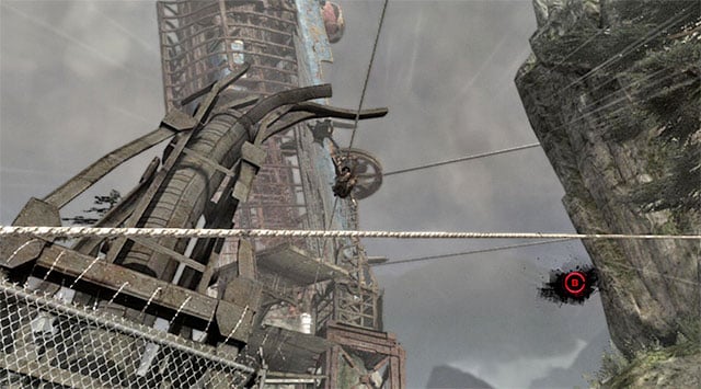 Soon, Lara will start sliding down a zip-line, but it wont be a ride free of excitement - Travel to the Survivors Camp | 20: The Fast Way Down Walkthrough - 20: The Fast Way Down | Walkthrough - Tomb Raider Game Guide