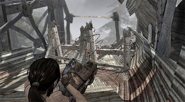 Use the shotgun to blast through the barricade - Travel to the Survivors Camp | 20: The Fast Way Down Walkthrough - 20: The Fast Way Down | Walkthrough - Tomb Raider Game Guide