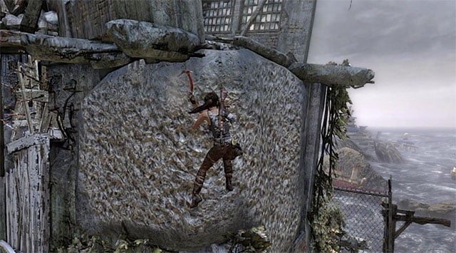 When you reach the top edge, move right and leap over to the interactive wall, helping yourself with the climbing axe - Reach the Endurance Wreck (part 1) | 22: Gone Missing Walkthrough - 22: Gone Missing | Walkthrough - Tomb Raider Game Guide