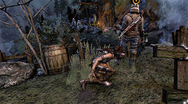 Let go of the rope and approach the enemy carefully in order to perform a stealth kill - Return to the Survivor Camp on the Beach | 22: Gone Missing Walkthrough - 22: Gone Missing | Walkthrough - Tomb Raider Game Guide