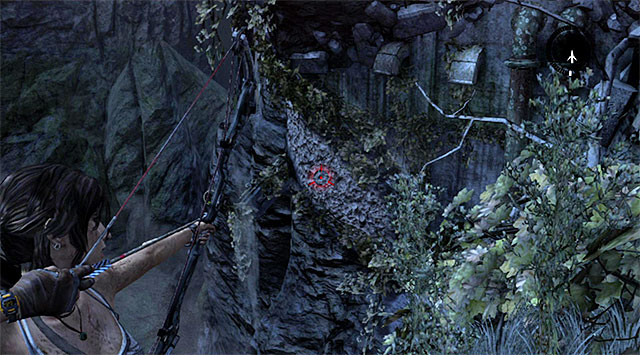 Position yourself at the edge and using the bow aim at another interactive wall shown on the screen, in order to make a rope bridge - Enter the Research Base | 23: Storm Chaser Walkthrough - 23: Storm Chaser | Walkthrough - Tomb Raider Game Guide