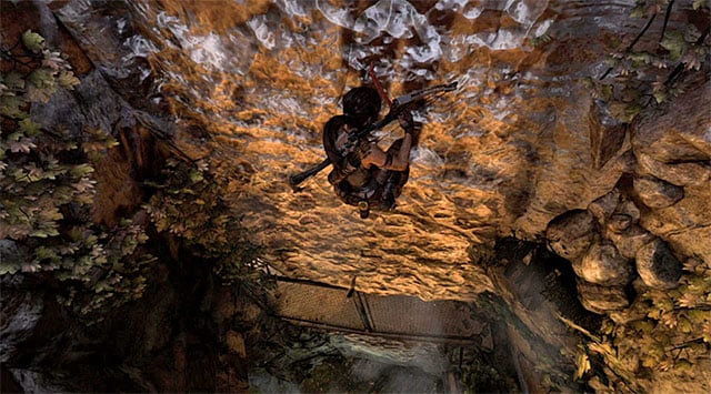 Start exploring Research Base location with jumping to the interactive wall with usage of the climbing axe - Discover the Ancient Tomb | 23: Storm Chaser Walkthrough - 23: Storm Chaser | Walkthrough - Tomb Raider Game Guide