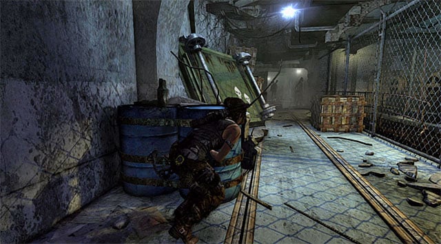 Carefully approach the corridor occupied by two bandits - Discover the Ancient Tomb | 23: Storm Chaser Walkthrough - 23: Storm Chaser | Walkthrough - Tomb Raider Game Guide