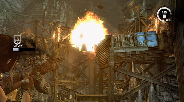 It is best to start the fight with shooting the explosive barrels shown on the screen - Exit the Research Base | 23: Storm Chaser Walkthrough - 23: Storm Chaser | Walkthrough - Tomb Raider Game Guide