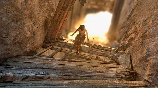 After regaining control over Lara you have to run towards your display, so keep your analog down (or hold the down movement key) - Search the Monastery for Sam | 24: Going Back In Walkthrough - 24: Going Back In | Walkthrough - Tomb Raider Game Guide