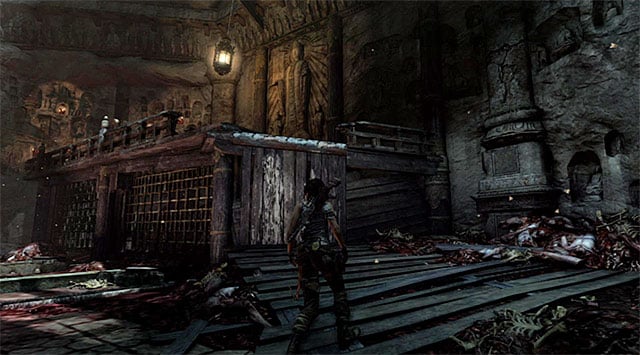 Approach the locked door and open it using the axe - Rescue Sam from Mathias (part 1) | 24: Going Back In Walkthrough - 24: Going Back In | Walkthrough - Tomb Raider Game Guide