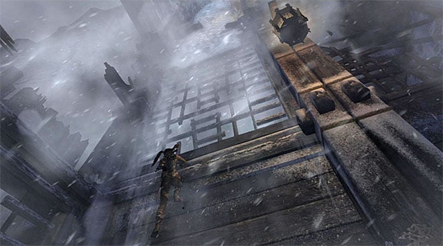 Start climbing up and after your current fragment of the wall gets destroyed, move to the right so you can resume the climbing - Rescue Sam from Mathias (part 2) | 24: Going Back In Walkthrough - 24: Going Back In | Walkthrough - Tomb Raider Game Guide