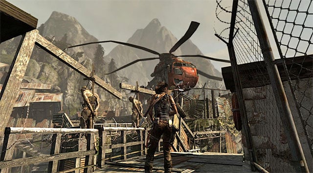 Head north-east, but when you reach the area where the enemies had just been, turn left, changing the direction to north-west - Search the Rescue Helicopter for Medical Supplies | 13: Open Wounds Walkthrough - 13: Open Wounds | Walkthrough - Tomb Raider Game Guide