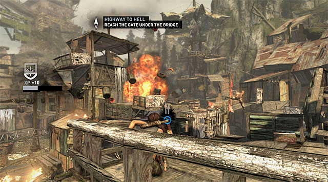 I also suggest keeping an eye out on the explosive barrels so that you can quickly shoot them when the enemies are close (screenshot); its very helpful in clearing the area - Reach the Gate Under the Bridge | 14: Highway to Hell Walkthrough - 14: Highway to Hell | Walkthrough - Tomb Raider Game Guide