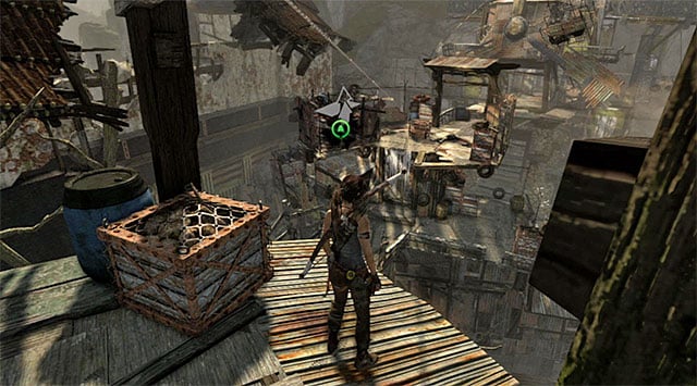 Turn east now, towards the ledge which two guards had just been occupying - Find Your Way to Grim | 15: Liberator Walkthrough - 15: Liberator | Walkthrough - Tomb Raider Game Guide