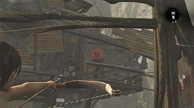 Stay on your guard; as soon as you reach the ledge, new enemies will show up to the east - Find Your Way to Grim | 15: Liberator Walkthrough - 15: Liberator | Walkthrough - Tomb Raider Game Guide