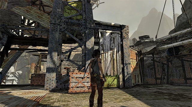Stay on the main floor and locate a wall Lara can use to get to the higher ledge (screenshot) - Find Your Way to Grim | 15: Liberator Walkthrough - 15: Liberator | Walkthrough - Tomb Raider Game Guide