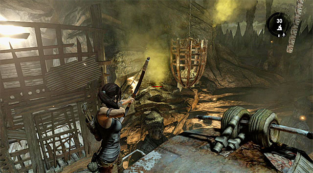 Get to the other side of the cage and shoot at the gas below, as pictured above - Rescue the Captured Endurance Crew | 16: No One Left Behind Walkthrough - 16: No One Left Behind | Walkthrough - Tomb Raider Game Guide