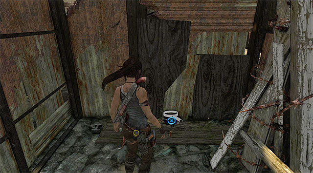 The Cache is on the ground (reward: 5 XP) - GPS Caches (01-07) | Collectibles: Shantytown - Collectibles: Shantytown - Tomb Raider Game Guide