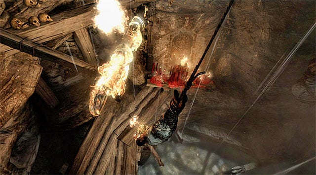 Swing the cocoon once again to get close to the flames on the left - Keep Moving Forward to Survive | 1: Survive Walkthrough - 1: Survive | Walkthrough - Tomb Raider Game Guide