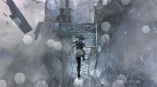 At the top, turn left and make your way to the large drawbridge - Reach the Top of the Falls | 8: Cry for Help Walkthrough - 8: Cry for Help | Walkthrough - Tomb Raider Game Guide