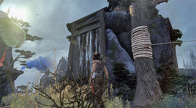 Slide down the line and locate the path that would take you the higher ledge - Reach the Smoke Beacon | 10: Guilty Conscience Walkthrough - 10: Guilty Conscience | Walkthrough - Tomb Raider Game Guide