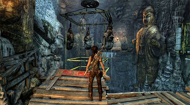 Stand in front of the platform with three cocoons - Tomb of the Unworthy | Optional Tombs: Mountain Village - Mountain Village | Optional Tombs - Tomb Raider Game Guide