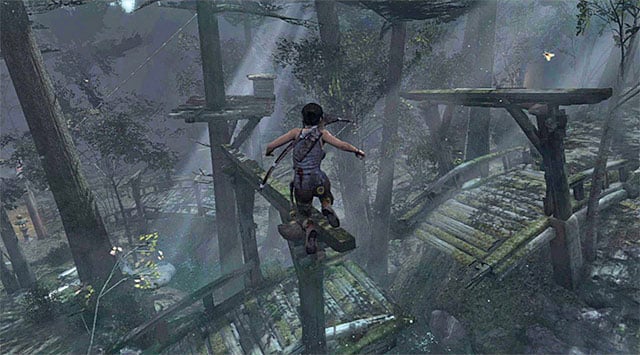 At the end of the path, turn left and jump towards the wooden structure that remained of the bridge - Treasure Maps | Collectibles: Coastal Forest - Collectibles: Coastal Forest - Tomb Raider Game Guide