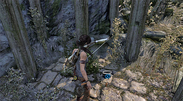 When she lands, go down the stairs and search the area under the hut - GPS Caches (08-15) | Collectibles: Mountain Village - Collectibles: Mountain Village - Tomb Raider Game Guide