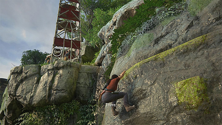 Grab on to the green ledges on the cliff wall and climb up - Reach the railway station - 8. Partners - Walkthrough - Uncharted: The Lost Legacy Game Guide