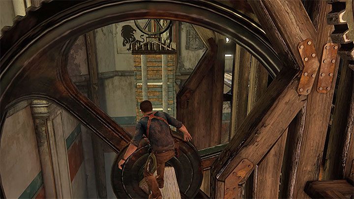 Ignore the cogs to higher levels of the tower and, instead, stand on the projecting wooden beam shown in the above screenshot - Uncharted 4: Chapter 11 Hidden in Plain Sight - walkthrough - Walkthrough - Uncharted 4: A Thiefs End Game Guide