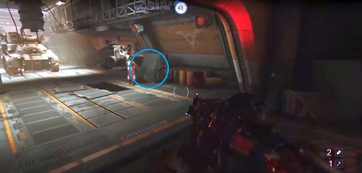 Golden Item #47 is hidden behind the crates (marked in blue). - Venus Transporthalle | Collectibles in Ubercommander Missions - Collectibles in Ubercommander Missions - Wolfenstein II: The New Colossus Game Guide