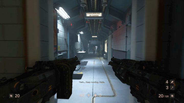The enemies make things easier by standing with their backs to you. - Elevator and Hangar | Chapter 4 - Roswell | Walkthrough - Chapter 4 - Roswell - Wolfenstein II: The New Colossus Game Guide