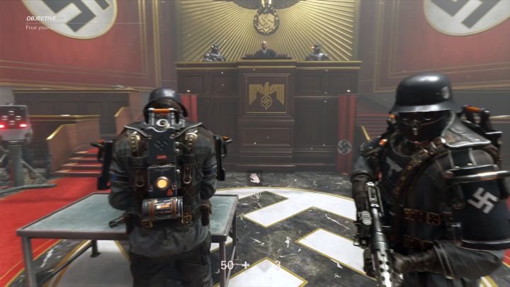 Free yourself by using a melee attack when its icon appears on the screen to. - The Courthouse | Chapter 5 - Monster | Walkthrough - Chapter 5 - Monster - Wolfenstein II: The New Colossus Game Guide